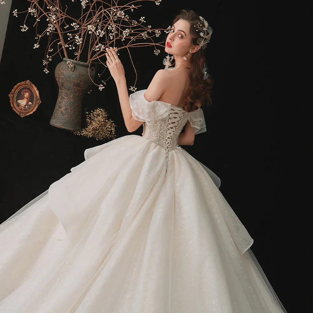 Off The Shoulder Short Sleeve Lace Up Back Sparkly Beading Crystal Princess Ball Gown Wedding Dress With Long Train