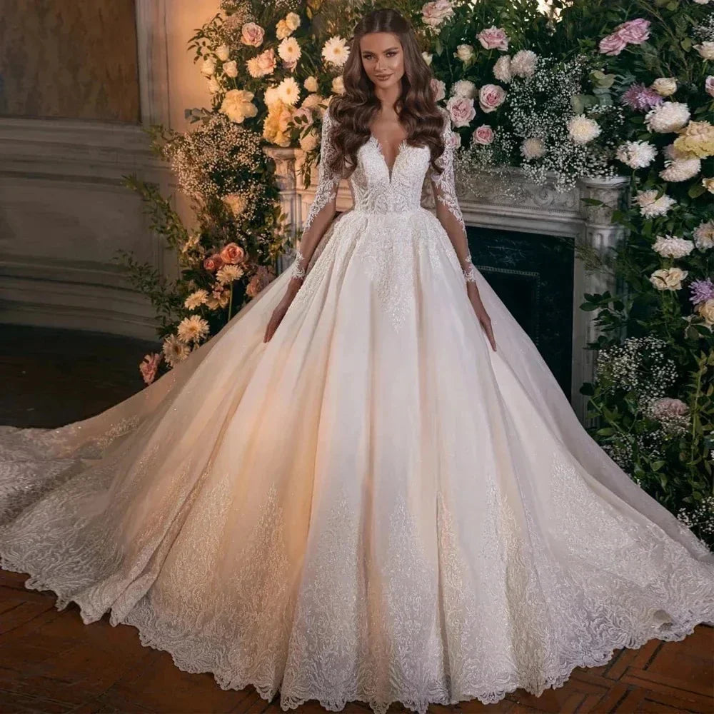 Vintage A-line wedding dress 2026 V-neck long sleeves illusion back buttons lace applique church bridal gown