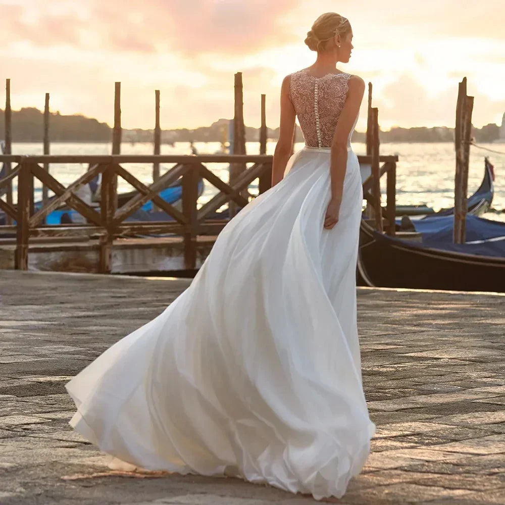 Elegant lace boho wedding dress V-neck chiffon A-line sleeveless lace appliques long bridal gown