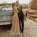 Gold beading glitter champagne illusion sequined long sleeve custom wedding dress back view
