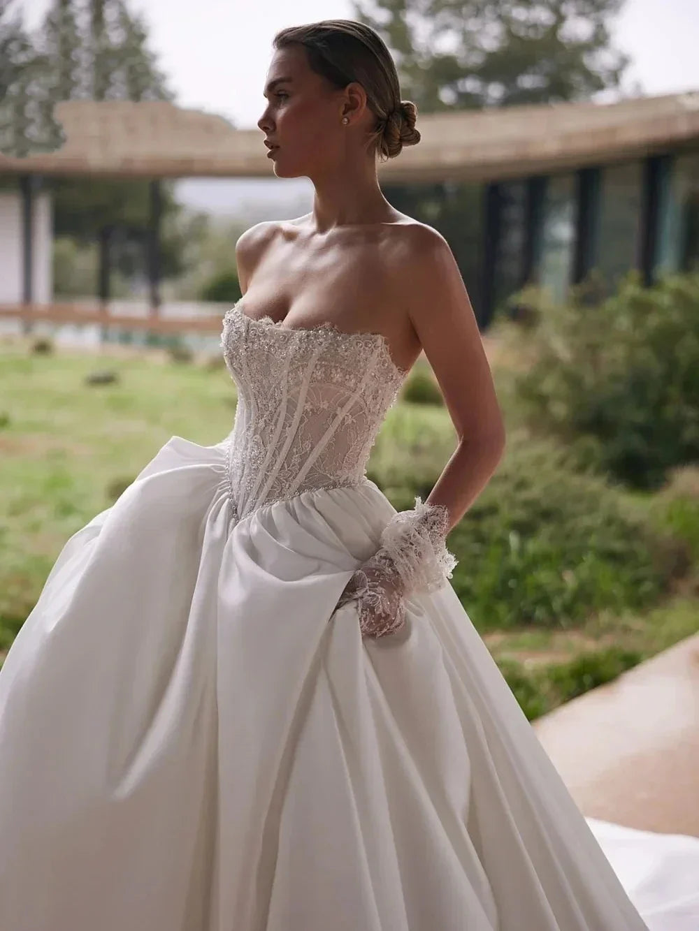 Luxurious A-line wedding dress 2026 strapless beaded pearls lace court train bridal gown