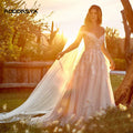 Off-shoulder strapless A-line lace sleeveless modest bridal gown side view