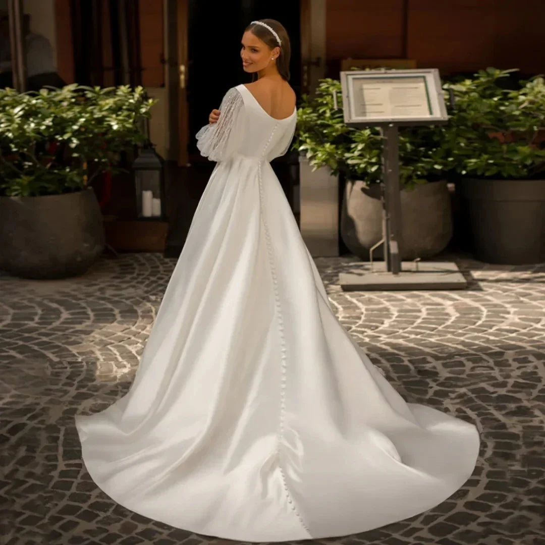 Romantic satin wedding dress 2026 puffed sleeves V-neck beading lace A-line bridal gown