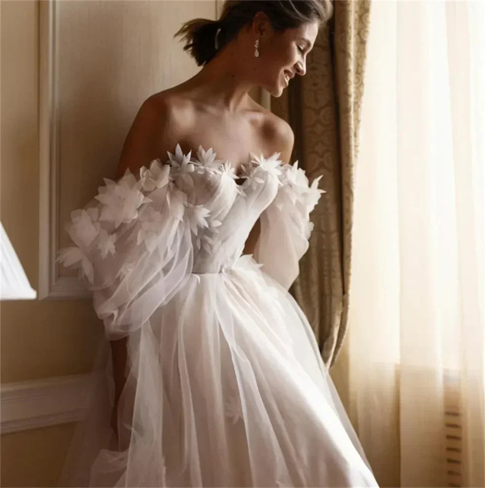 Floral off-shoulder A-line princess tulle sweep train floor-length bridal gown back view