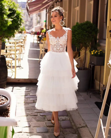 Princess sexy short A-line scoop tea length tulle tiered beach bridal gown front view