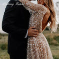 Champagne glitter illusion sequined gold beading long sleeve custom wedding dress front view