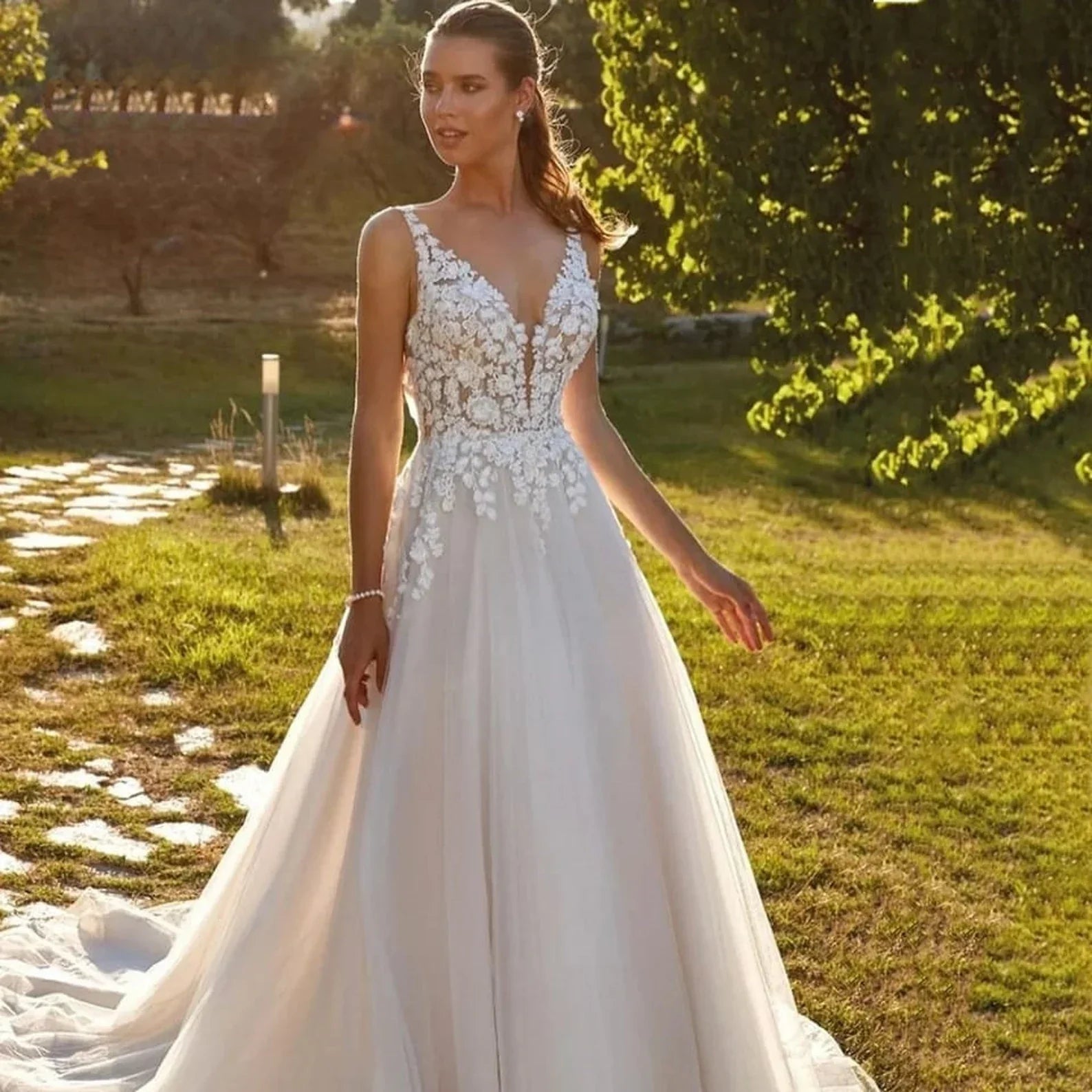 A Line Tulle Wedding Dress Sexy See Through Sleeveless Lace Appliques V Neck Bride Dressing Gown Buttons Robe Bride