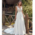 Open back button court train lace V-neck modern tulle pleat sleeveless wedding dress back view