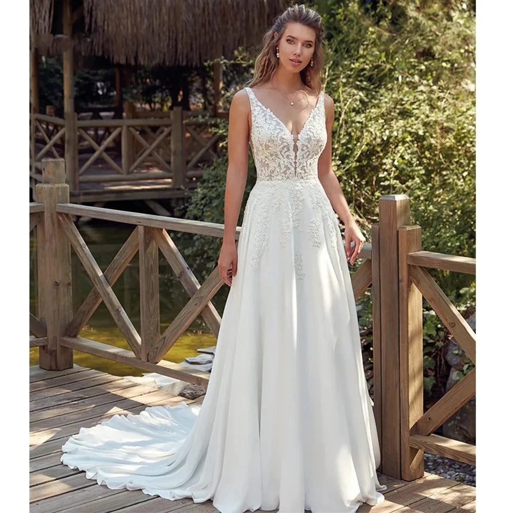 Open back button court train lace V-neck modern tulle pleat sleeveless wedding dress back view
