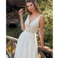 Modern lace tulle V-neck sleeveless pleat court train button open back wedding dress bridal gown